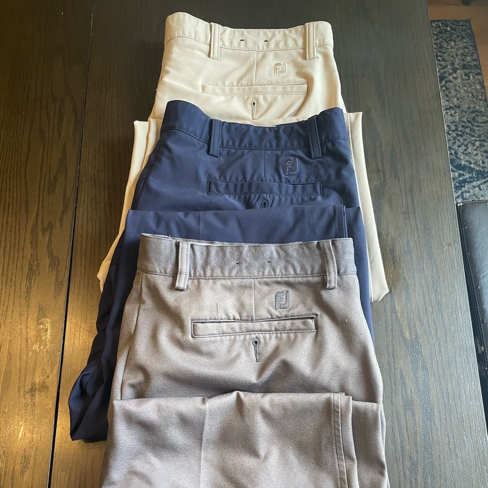 Three pair of footjoy golf pants. Hemmed to 36/30.